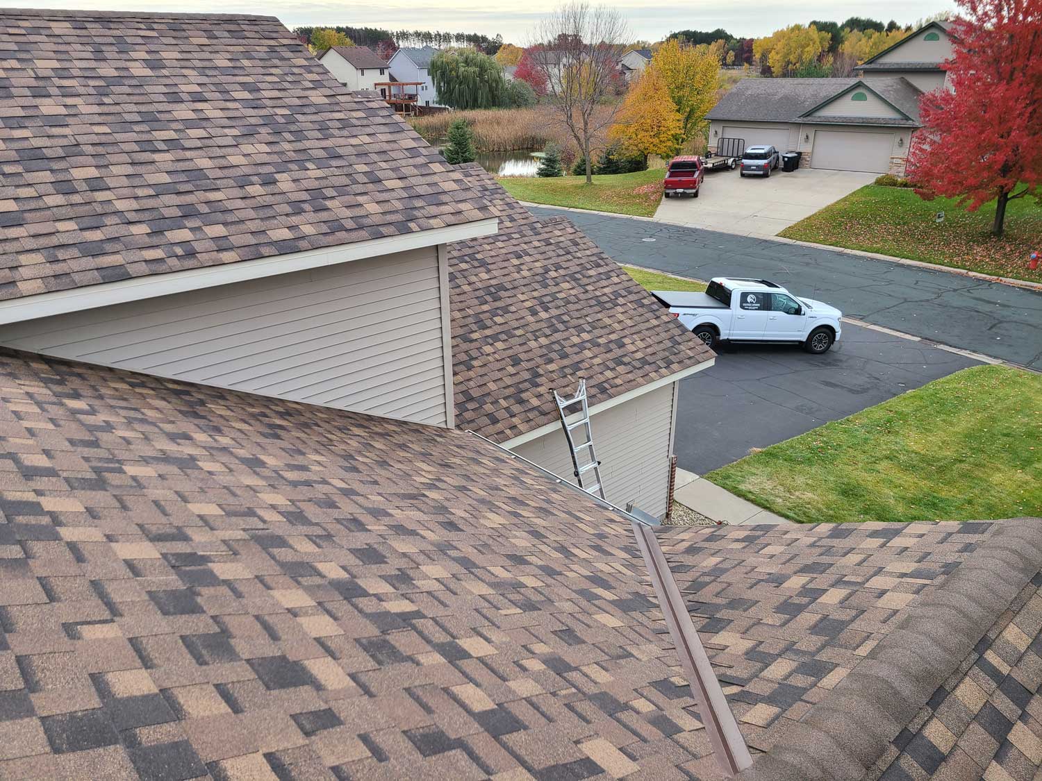 Completed work on a brown shingled roof in MN