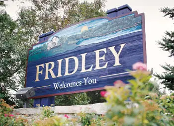 Fridley, MN Welcome sign surrounded by trees